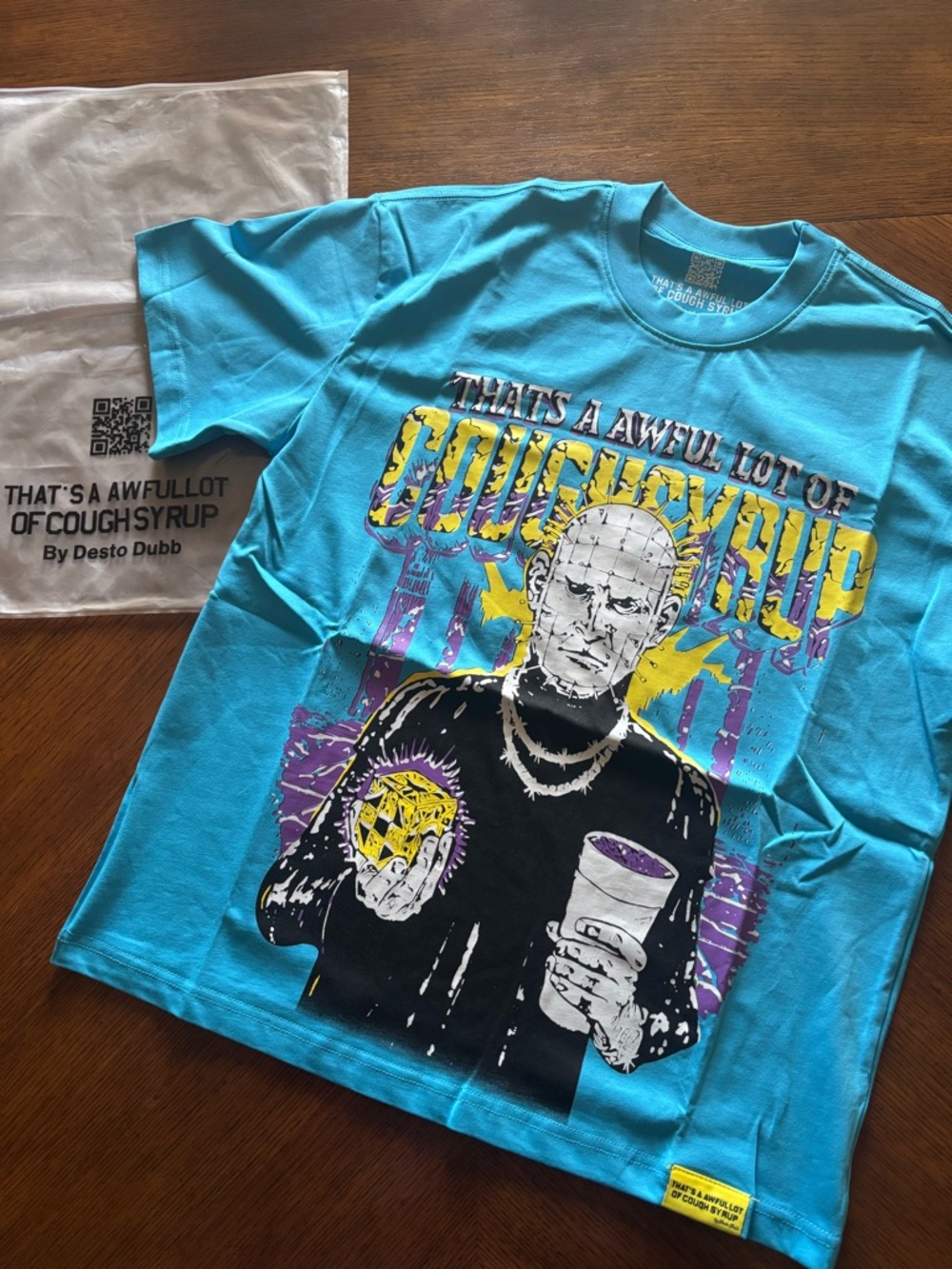Men's Turquoise Graphic Tee by Desto Dubb - 'That's A Awful Lot of Coughsyrup'